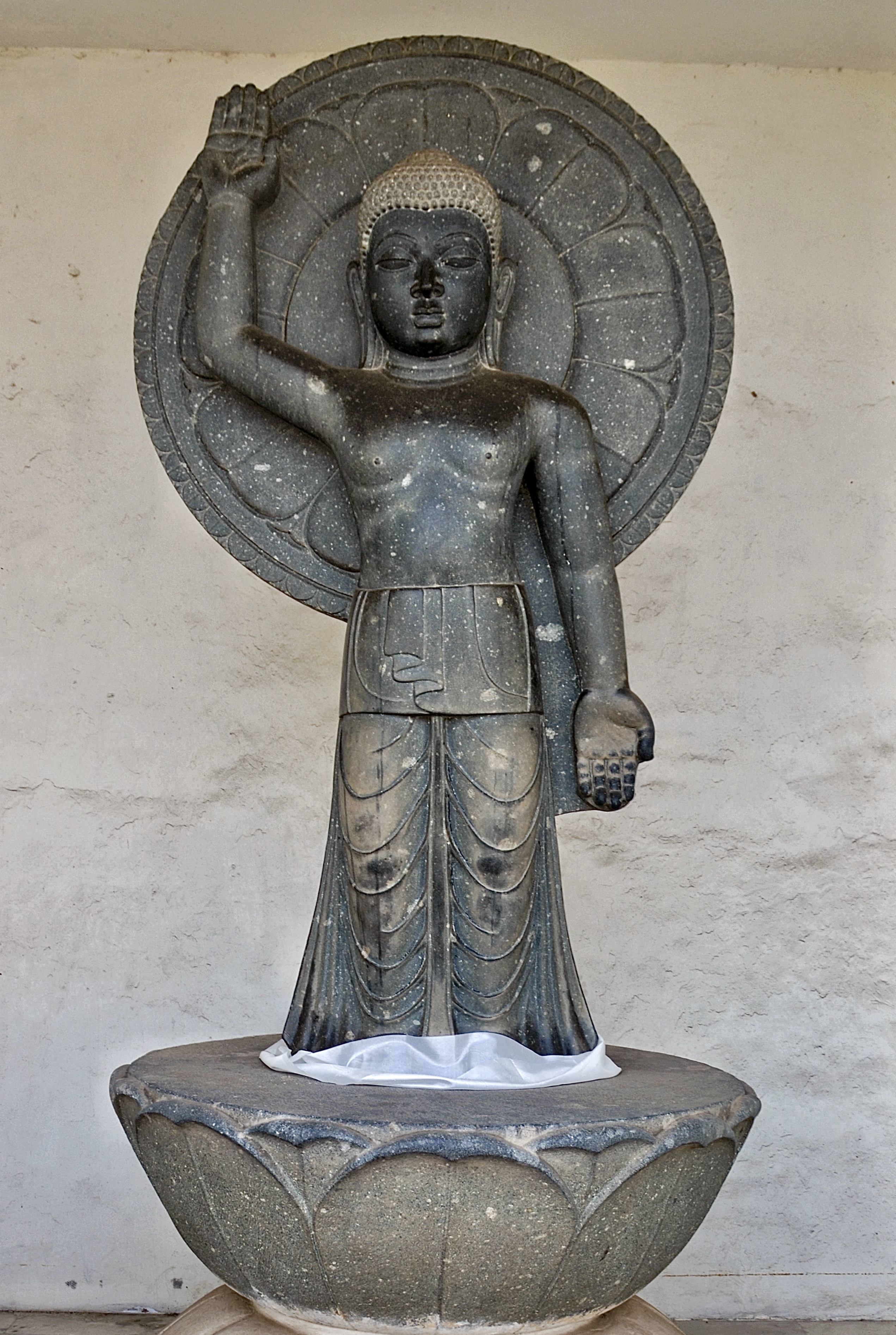 Dhauli Shanti Stupa - Buddha statue on the stupa terrace