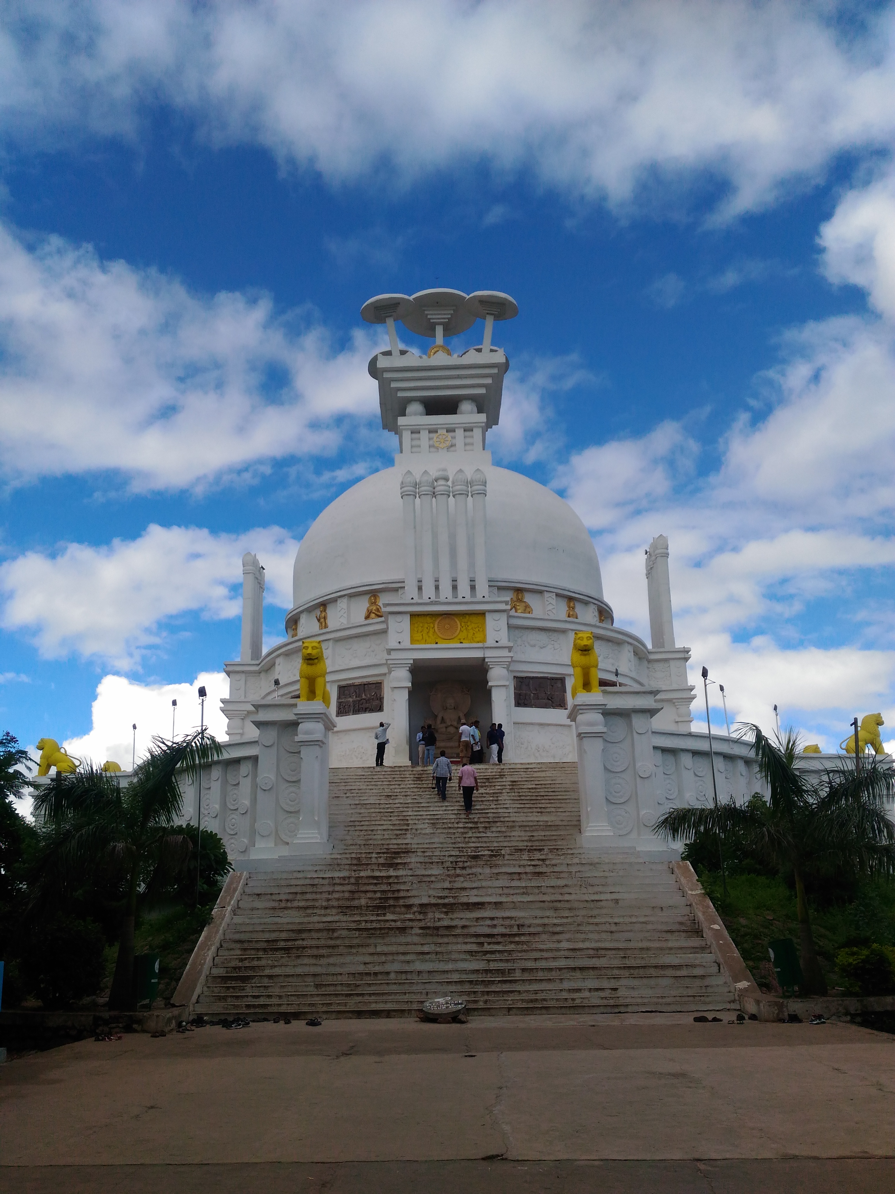 Dhauli Shanti Stupa - white dome and lion motif detail in Bhubaneswar, India
